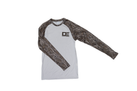 Paragon Men's Jackson Mossy Oak New Bottomland Colorblocked Long Sleeve Moisture Wicking T-Shirt With Left Chest DE Logo