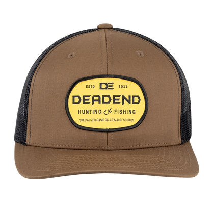 Yupoong Brown Front Black Back Trucker Yellow Woven Patch Hat